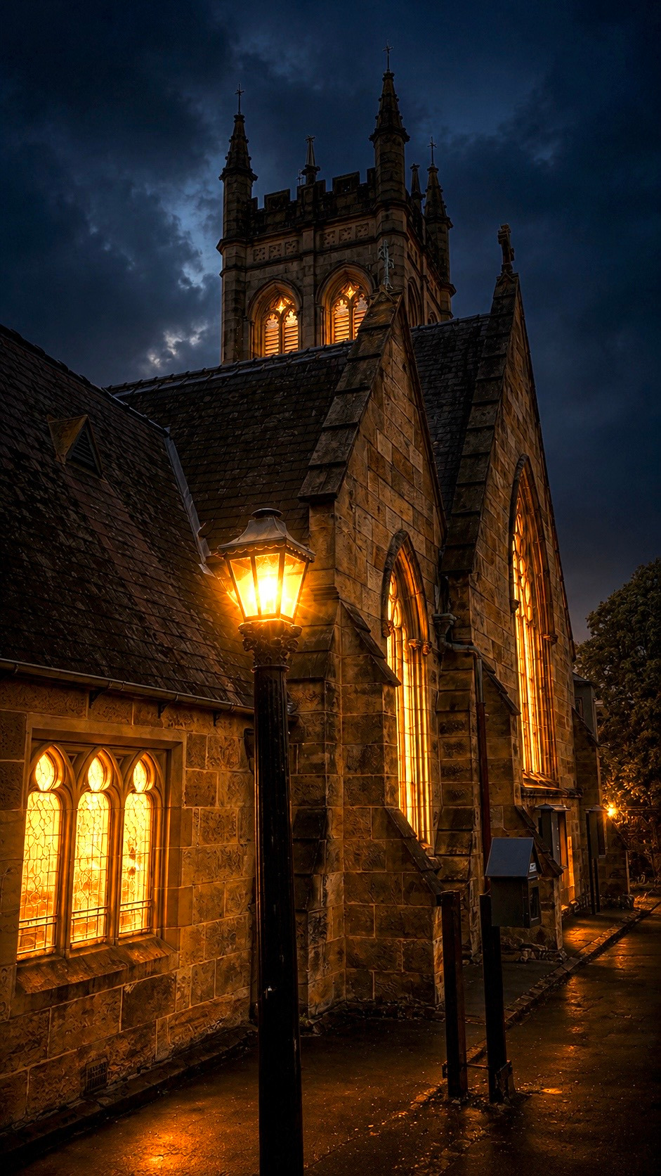 Sandstone facade and bell tower of St Paul's Anglican Church, Burwood